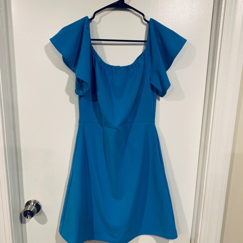 Off the shoulder dress.